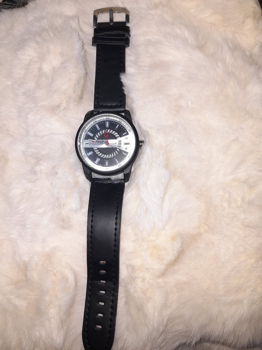 Ρολόι μαύρο με πολύ ιδιαίτερο καντράν.